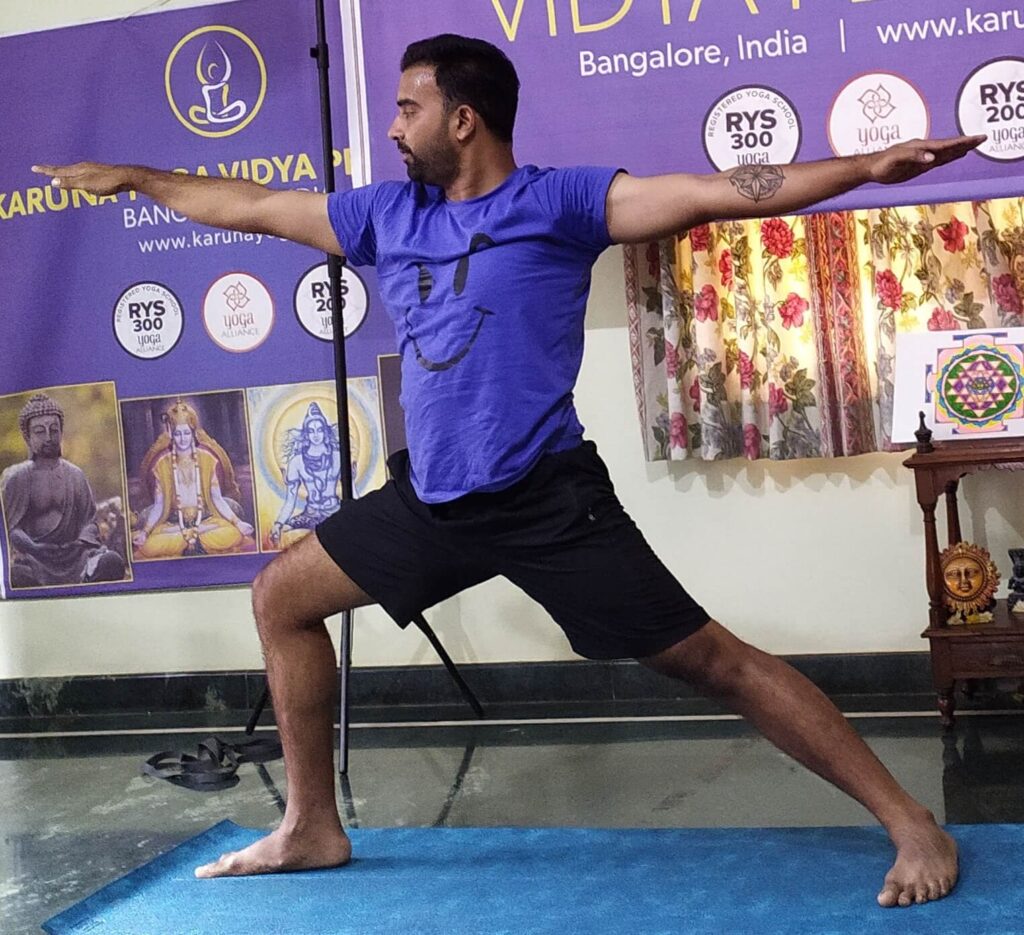 Virabhadrasana yoga pose in Hatha yoga training course